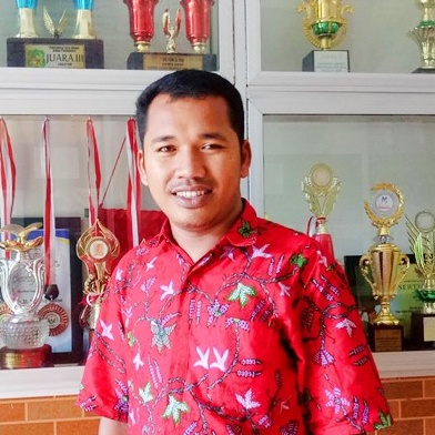 Mikael Tampubolon, S.Pd.